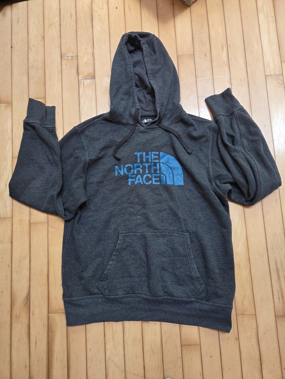The North Face Charcoal Gray Hoodie with Blue Logo